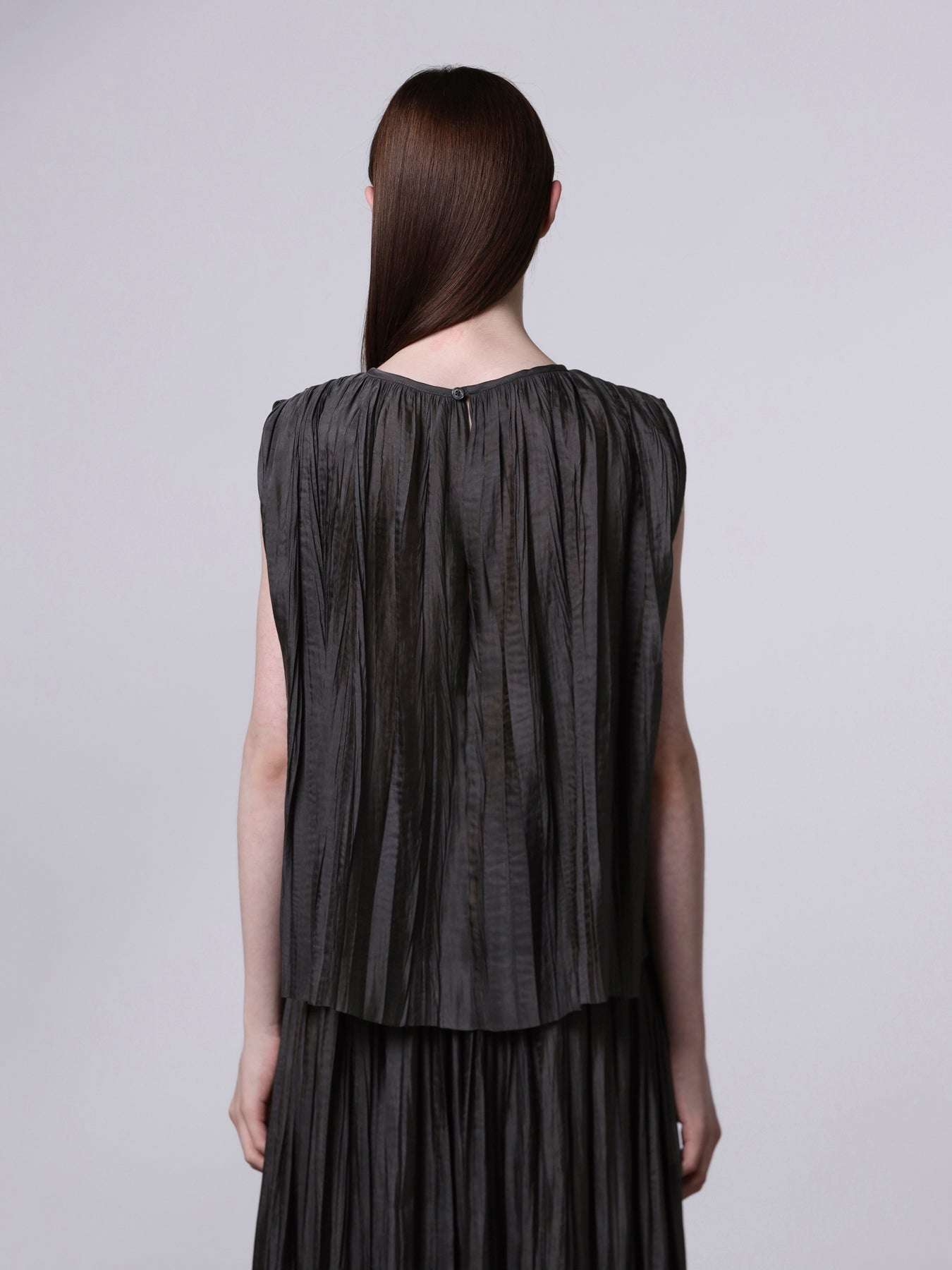 Top plissettato