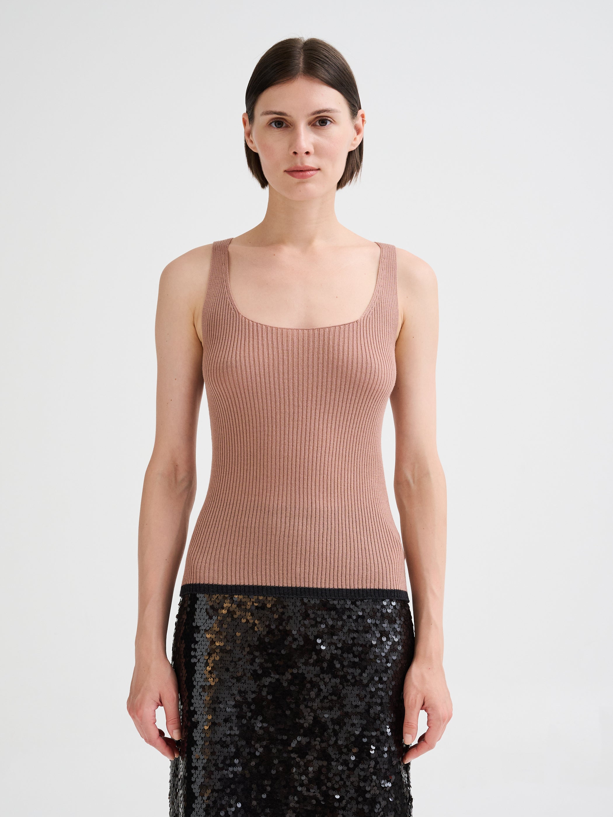 Top a coste in lana merino