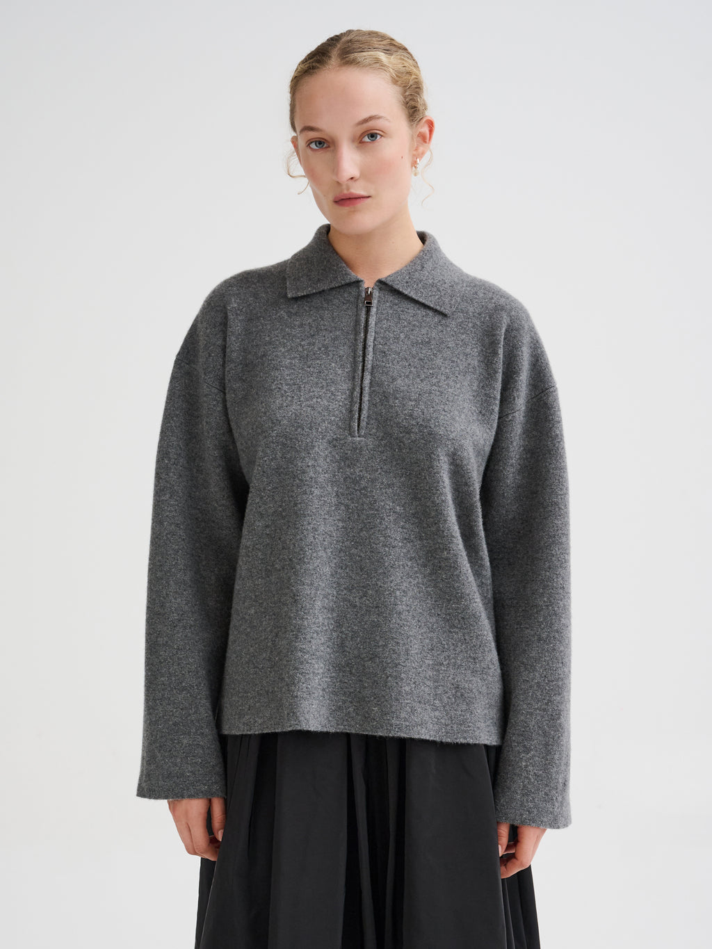 Polo con zip in lana merino