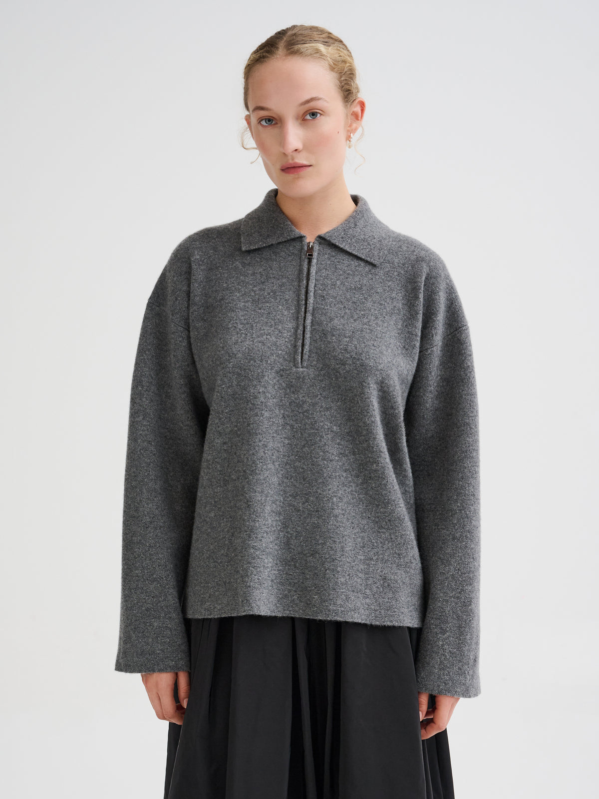 Polo con zip in lana merino