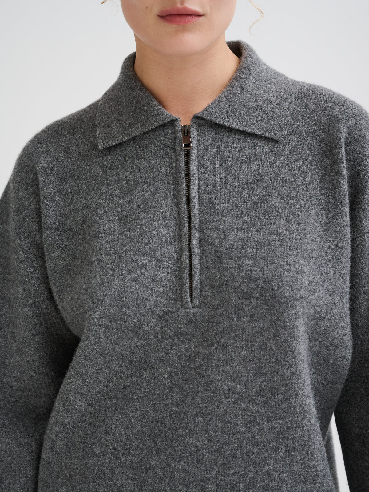 Polo con zip in lana merino