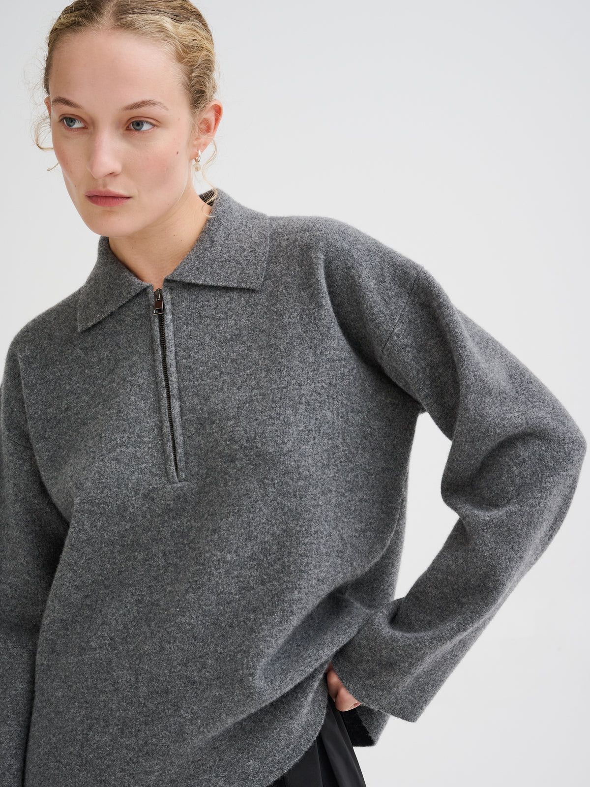 Polo con zip in lana merino