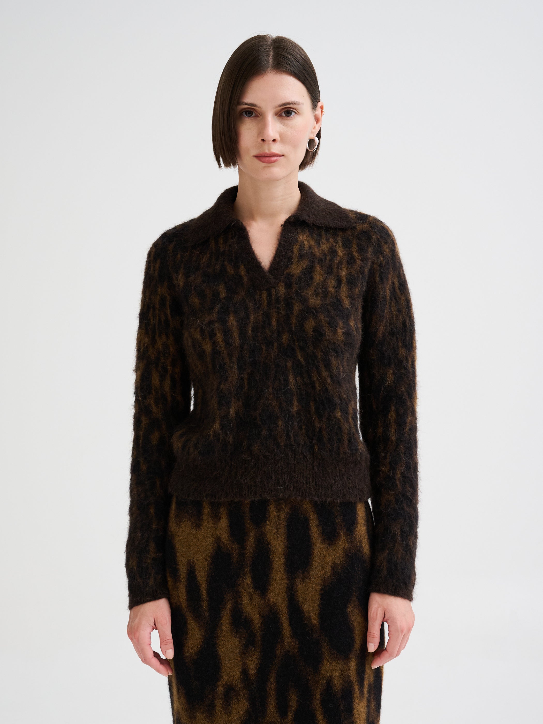 Polo con jacquard animalier