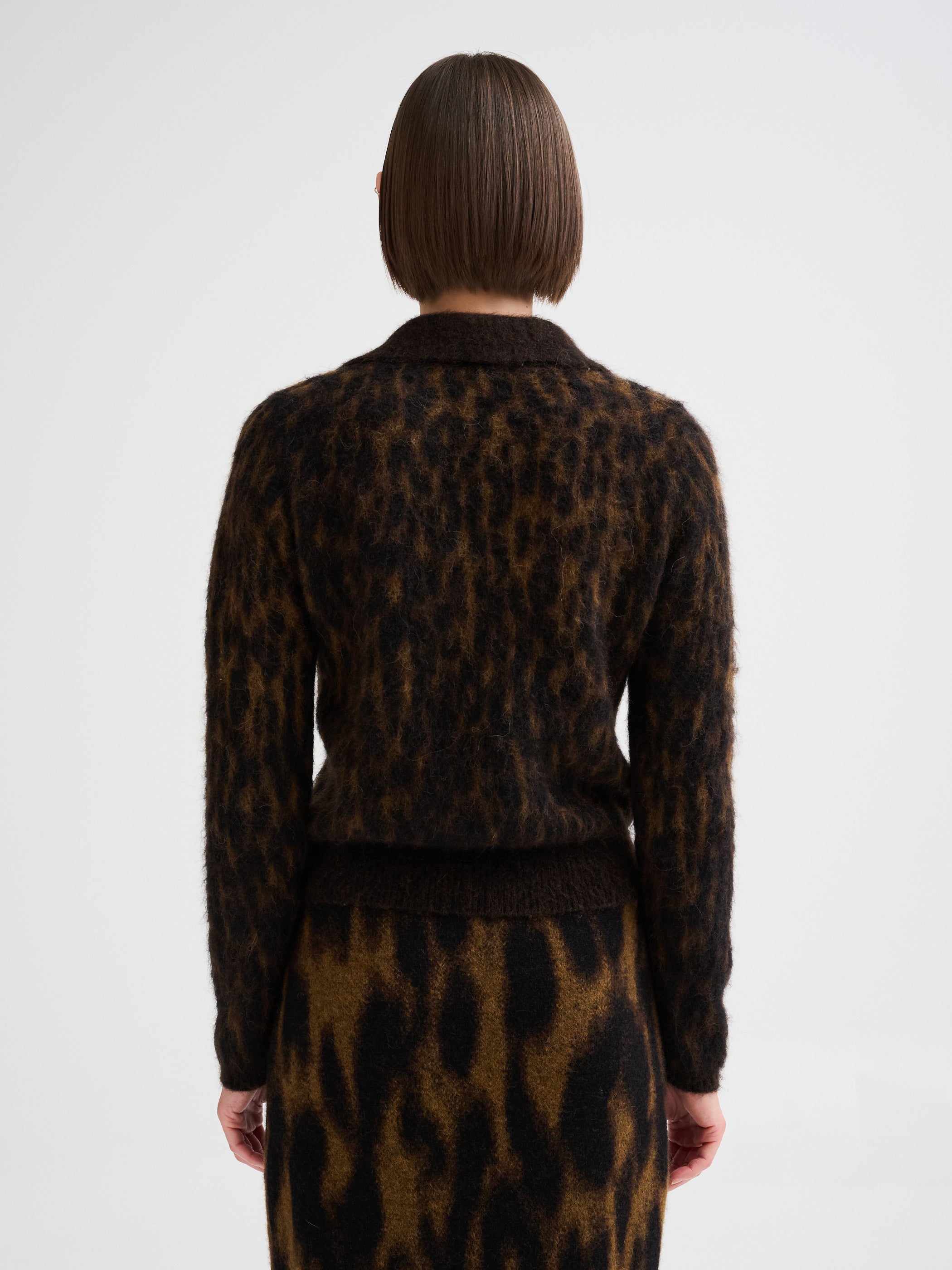 Polo con jacquard animalier