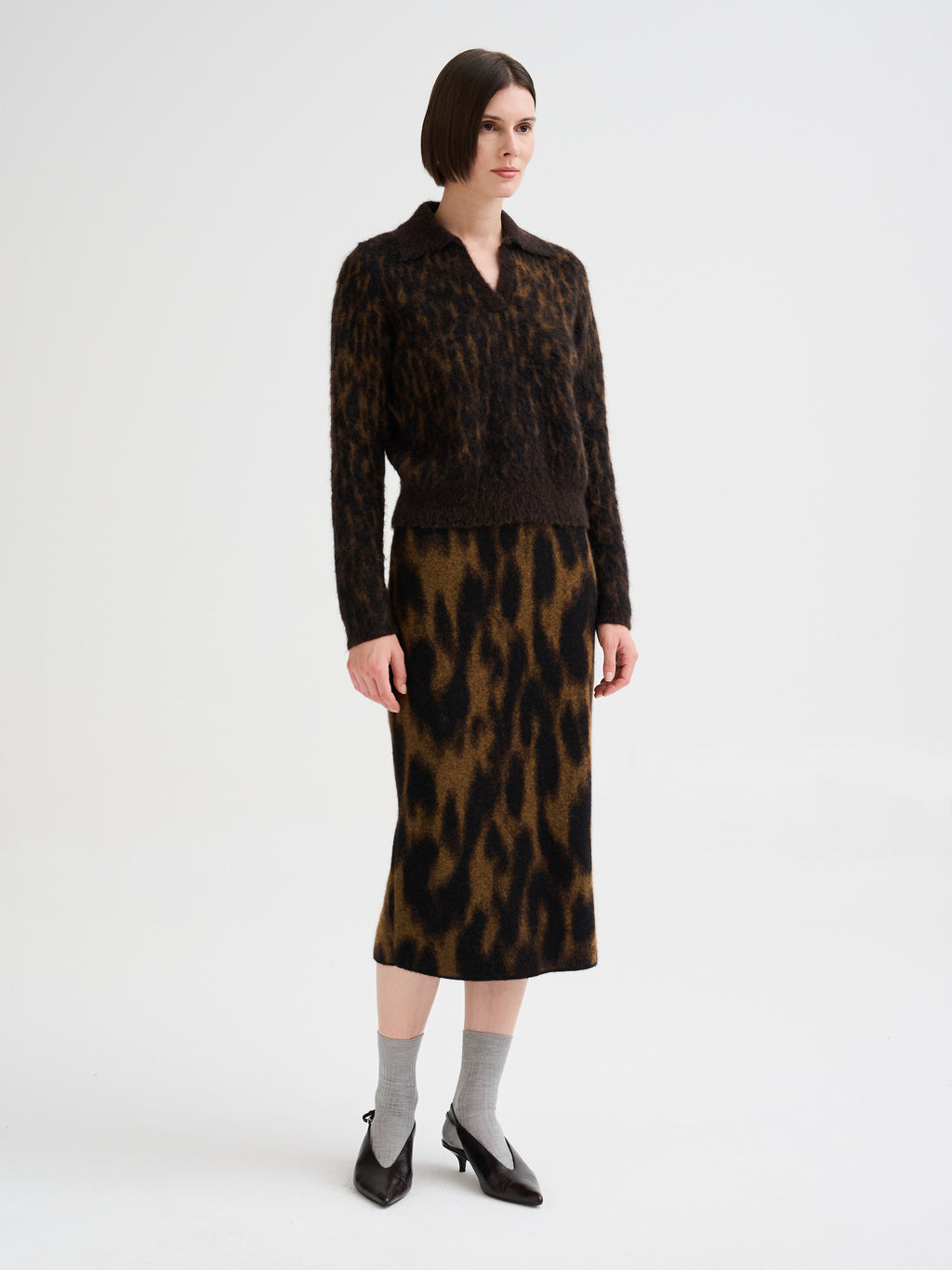 Polo con jacquard animalier