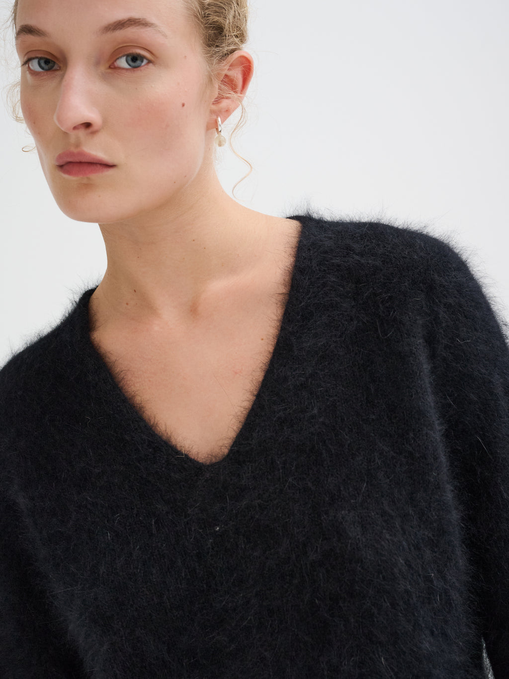 Scollo a v in angora