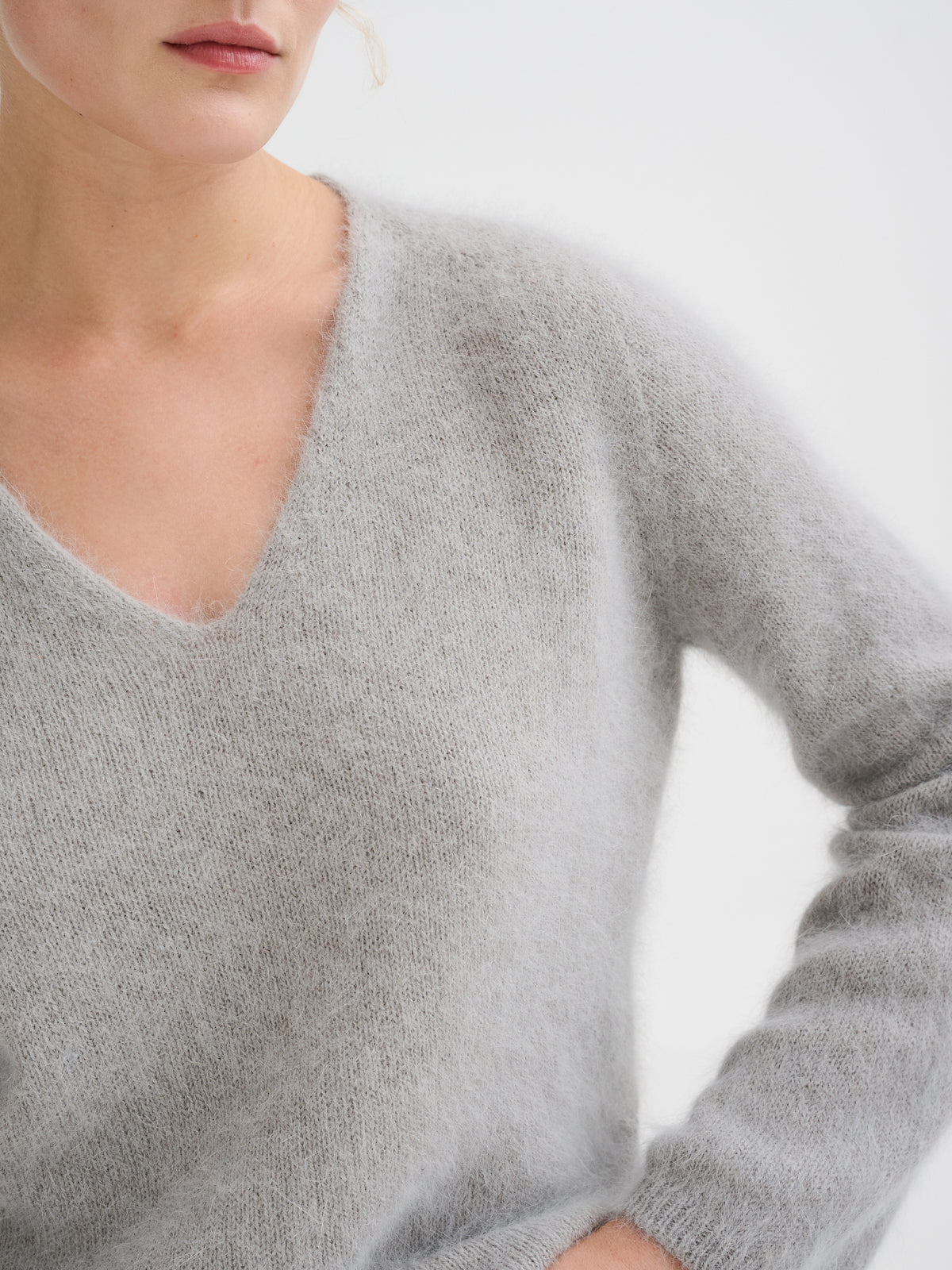 Scollo a v in angora