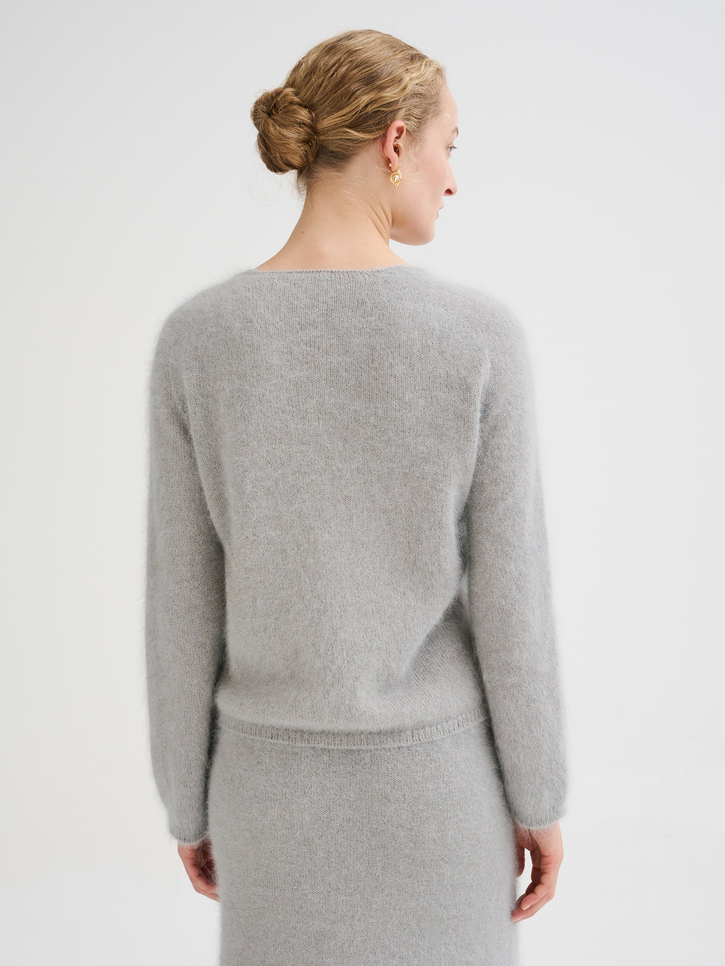 Scollo a v in angora