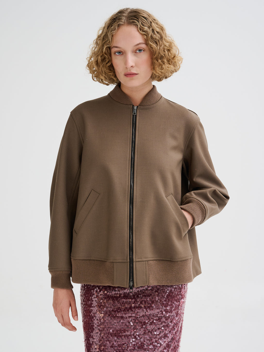 Bomber con piega sul retro