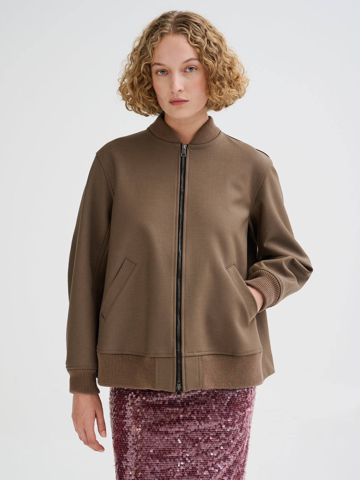 Bomber con piega sul retro