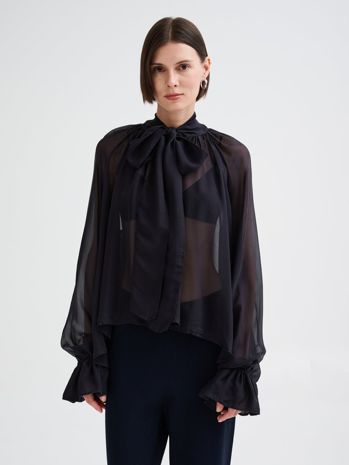 Blusa con fiocco in seta