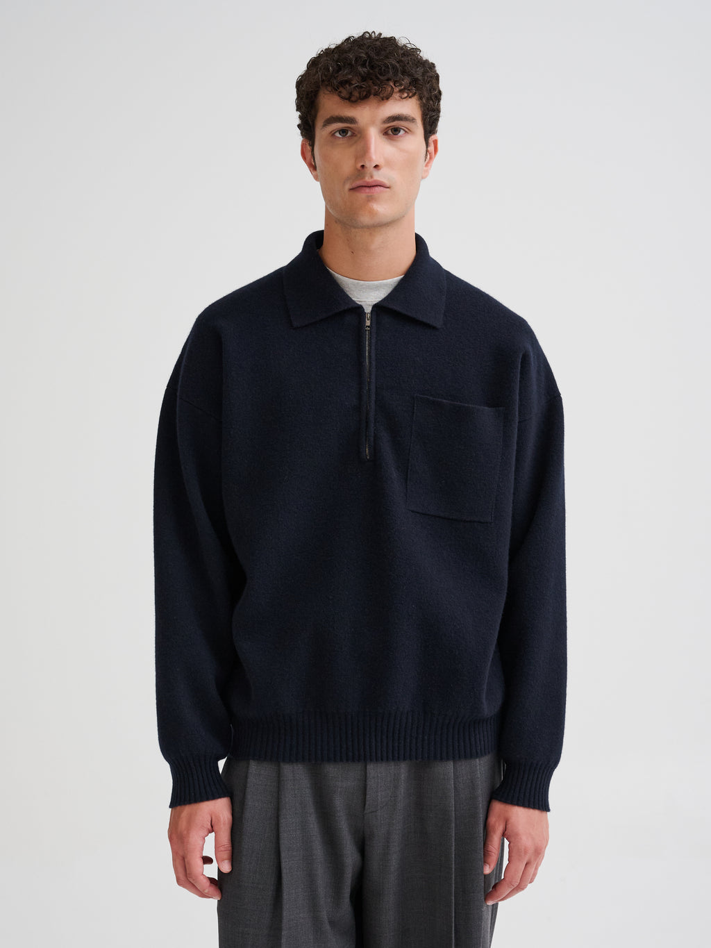 Polo con mezza zip