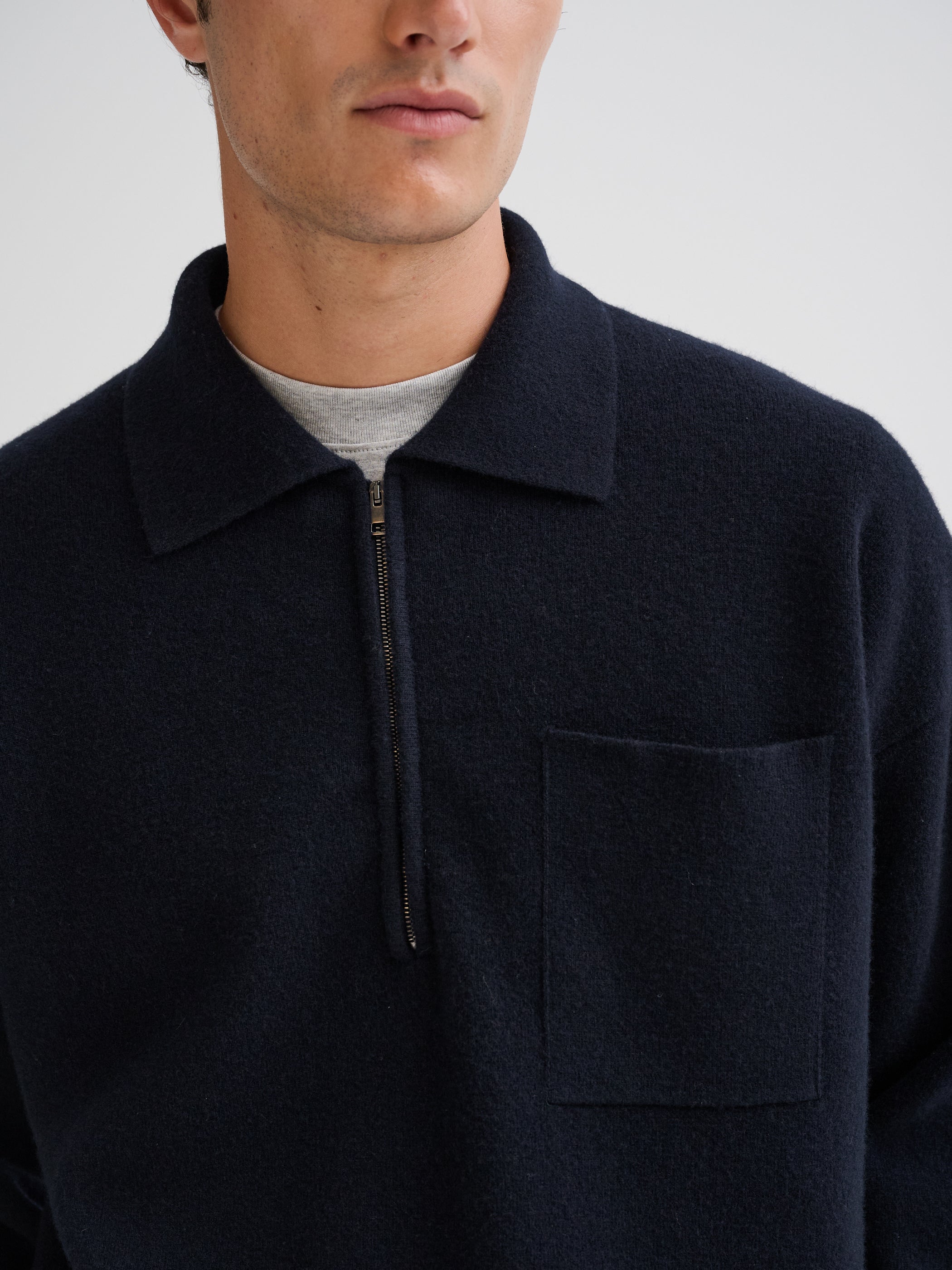 Polo con mezza zip