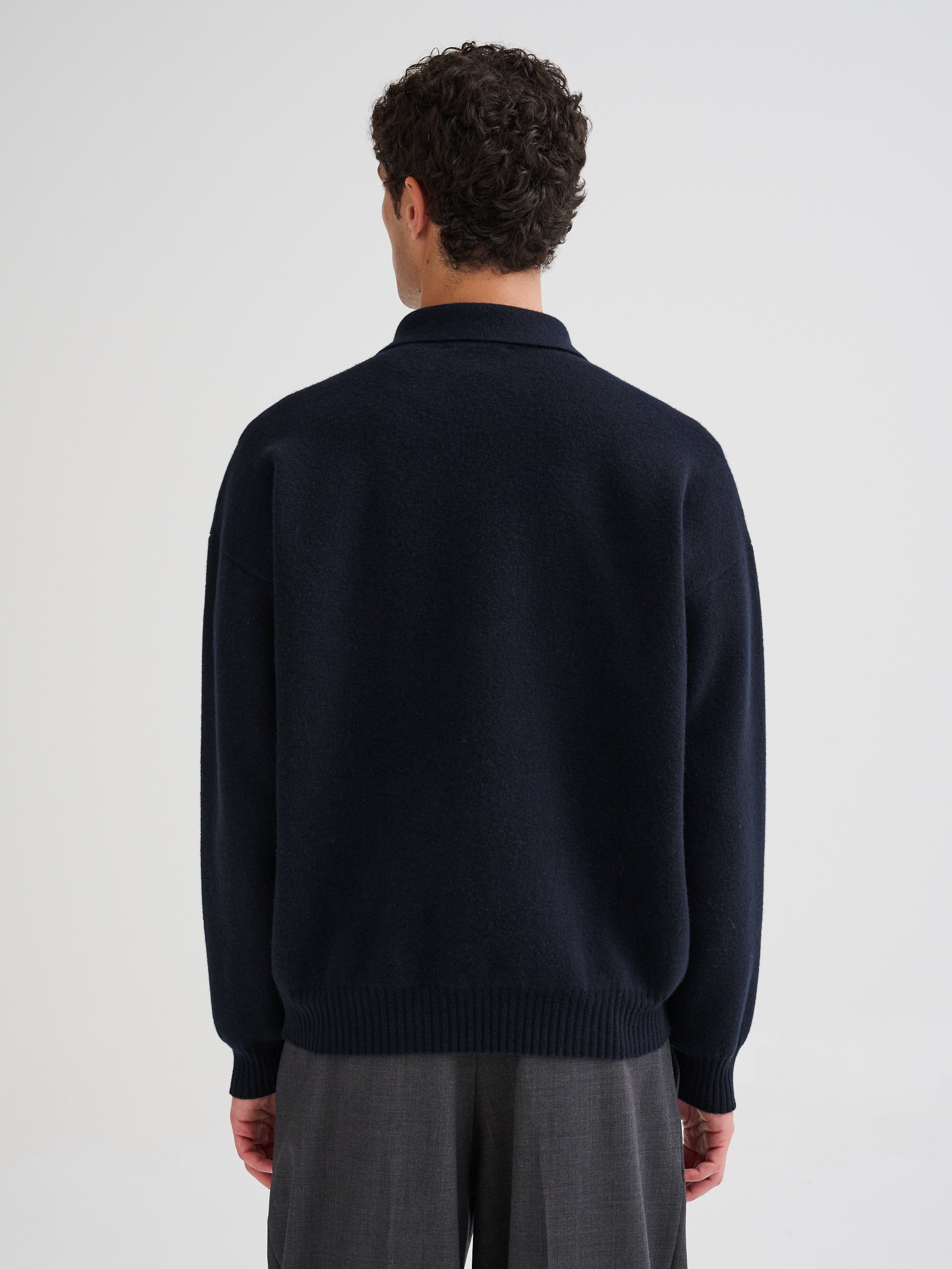 Polo con mezza zip