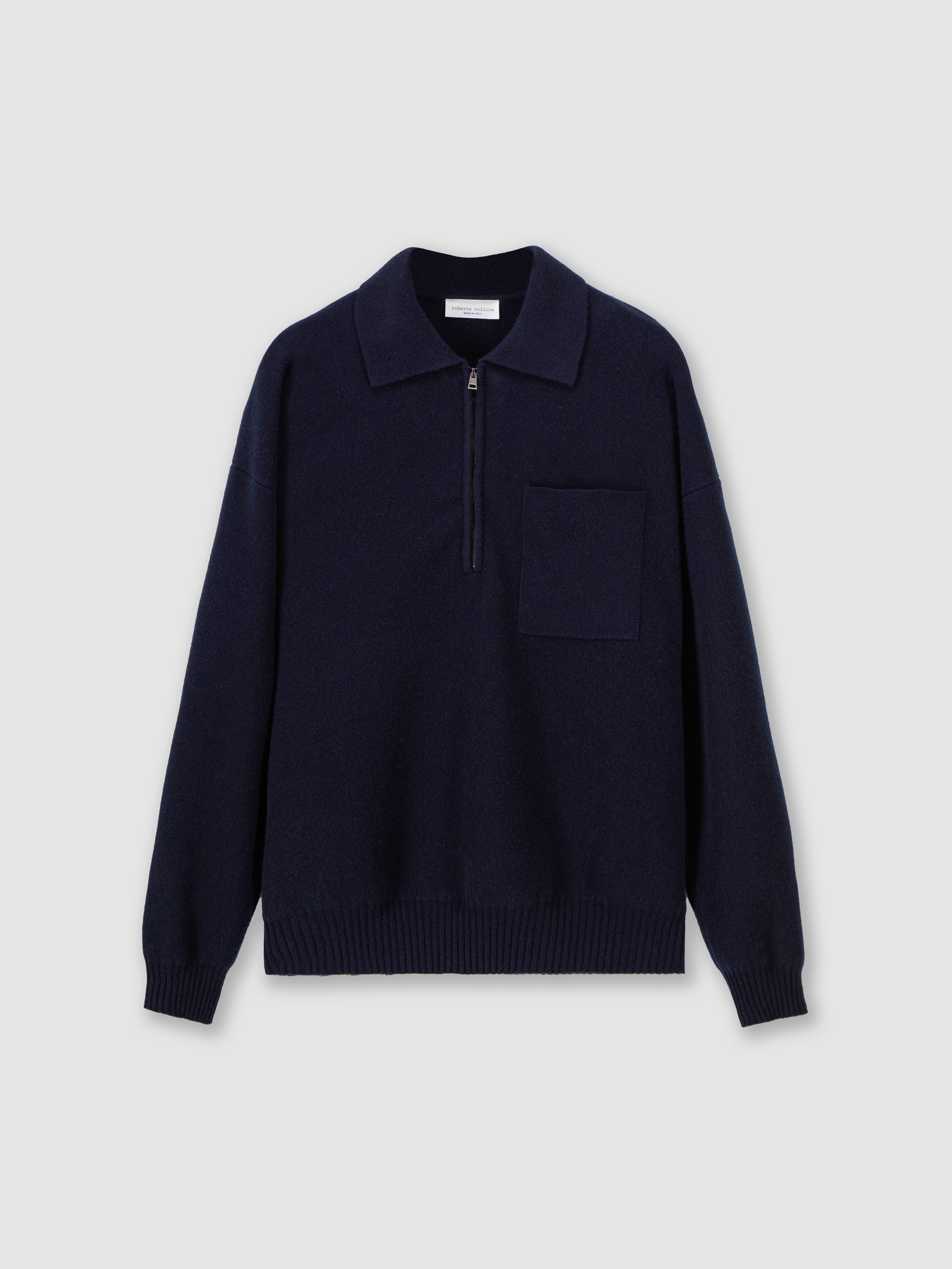 Polo con mezza zip