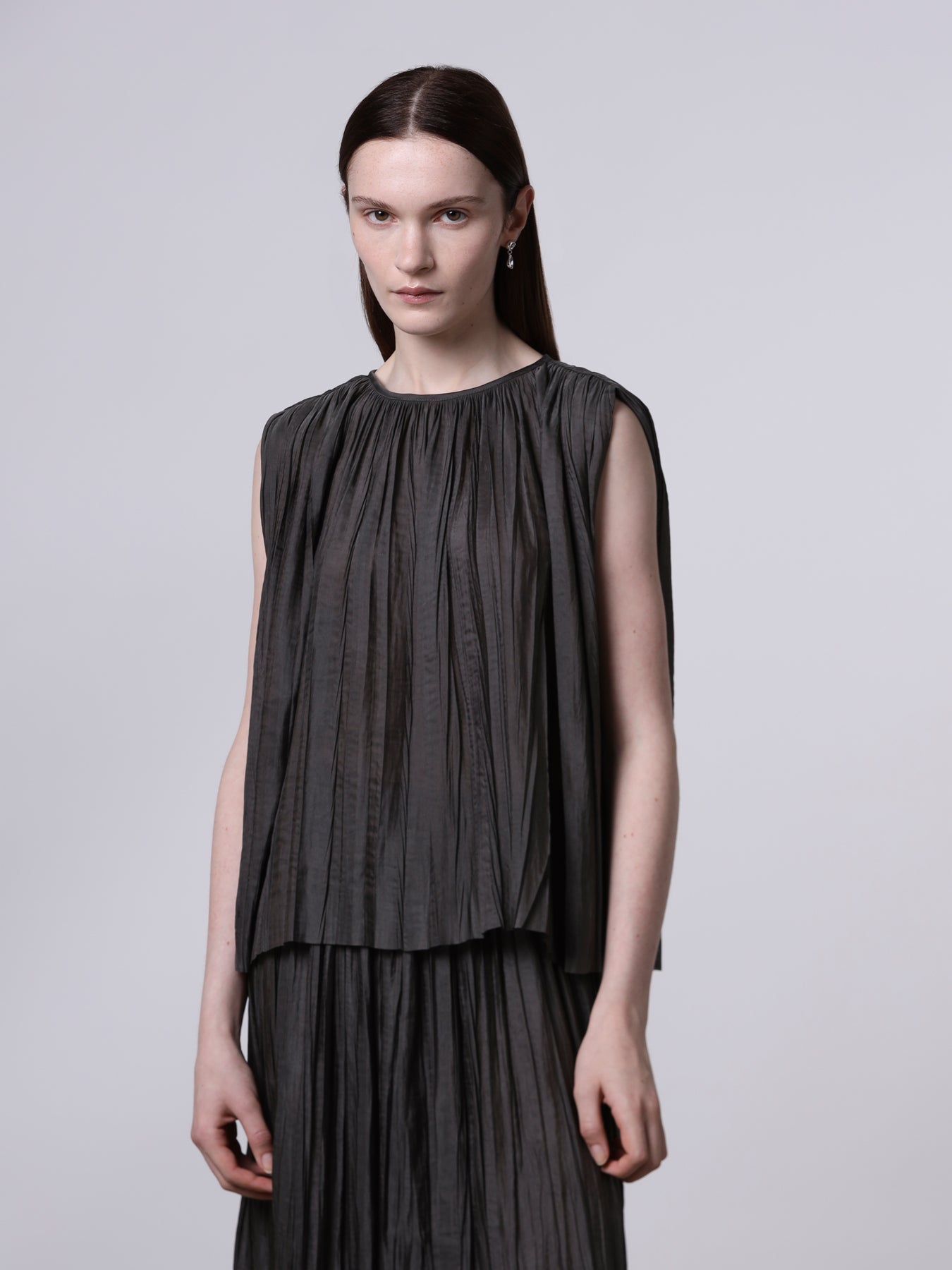 Top plissettato
