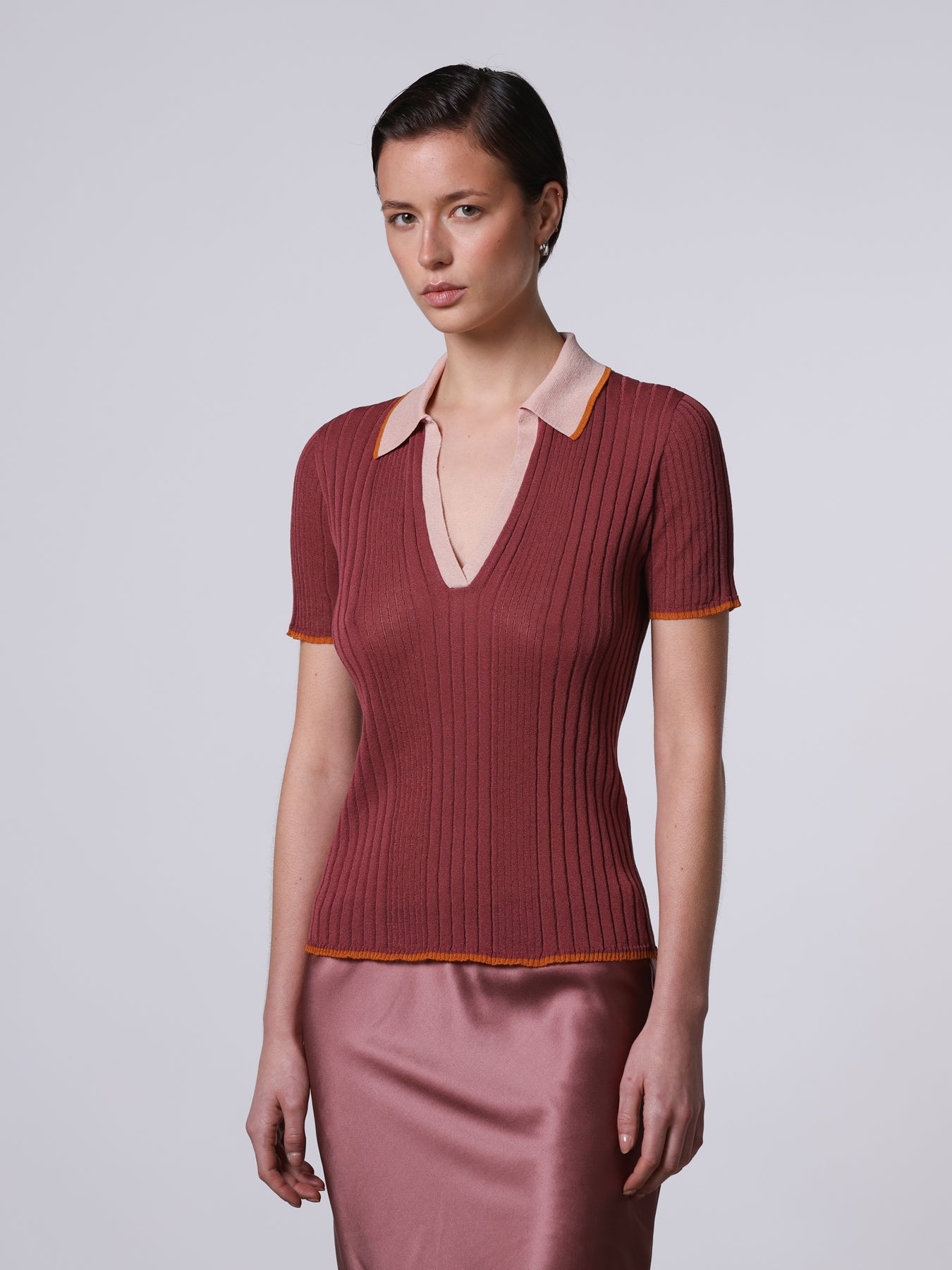 Polo a costine con dettagli a contrasto