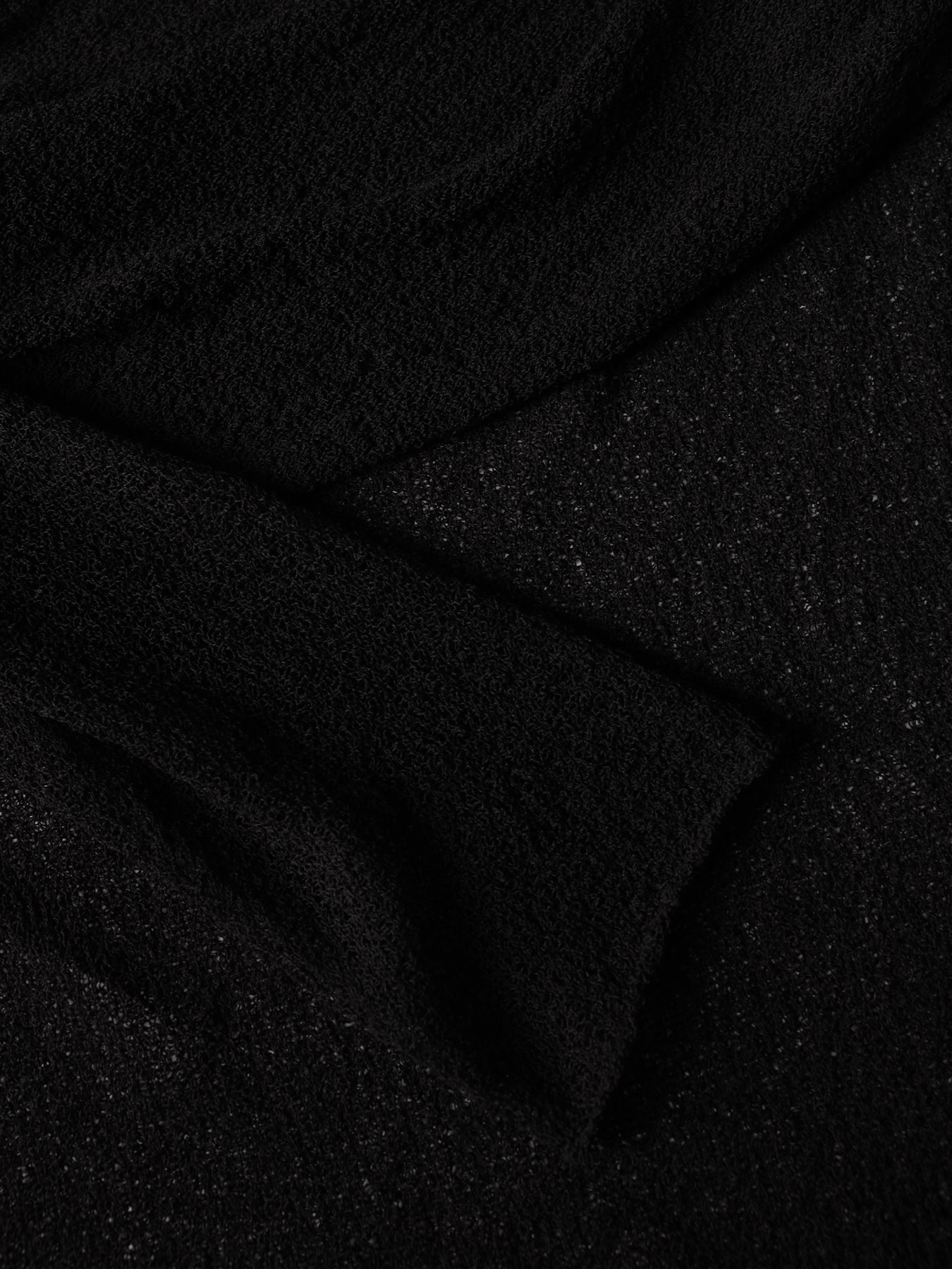 Off-shoulder traforata effetto pizzo