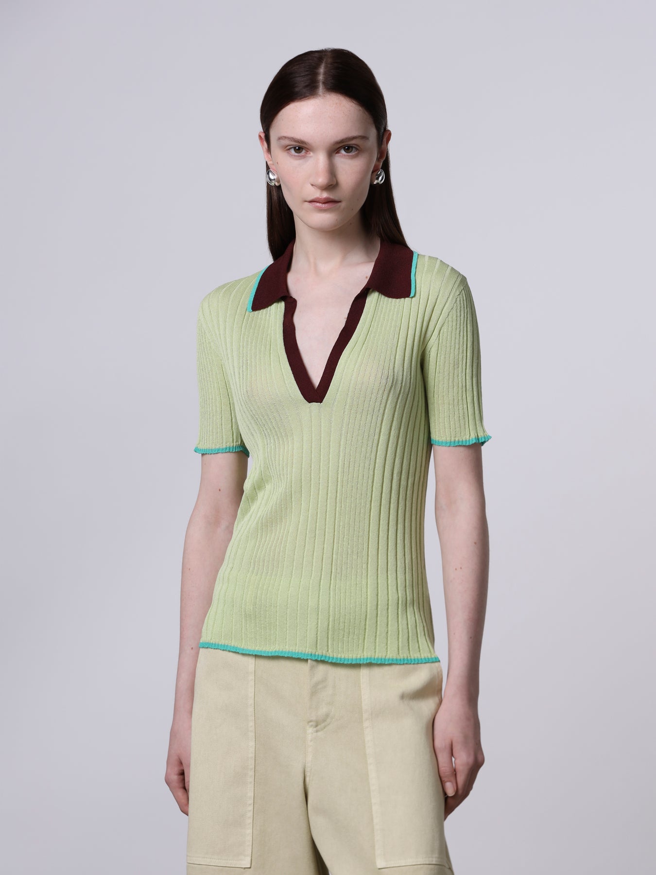 Polo a costine con dettagli a contrasto