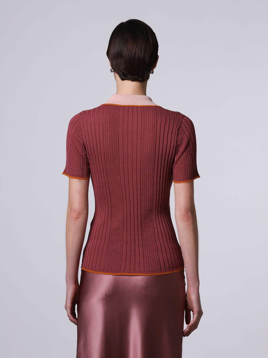 Polo a costine con dettagli a contrasto